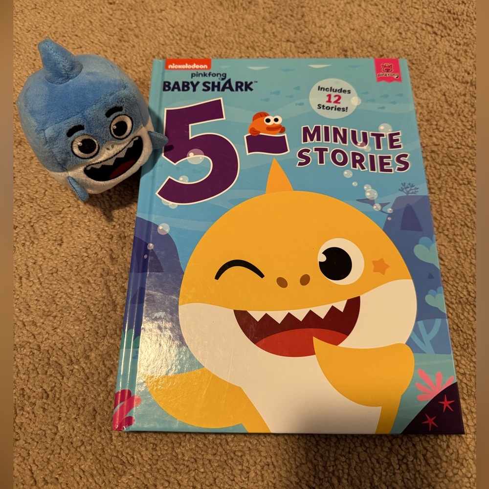 Like new. Baby shark book and toy.